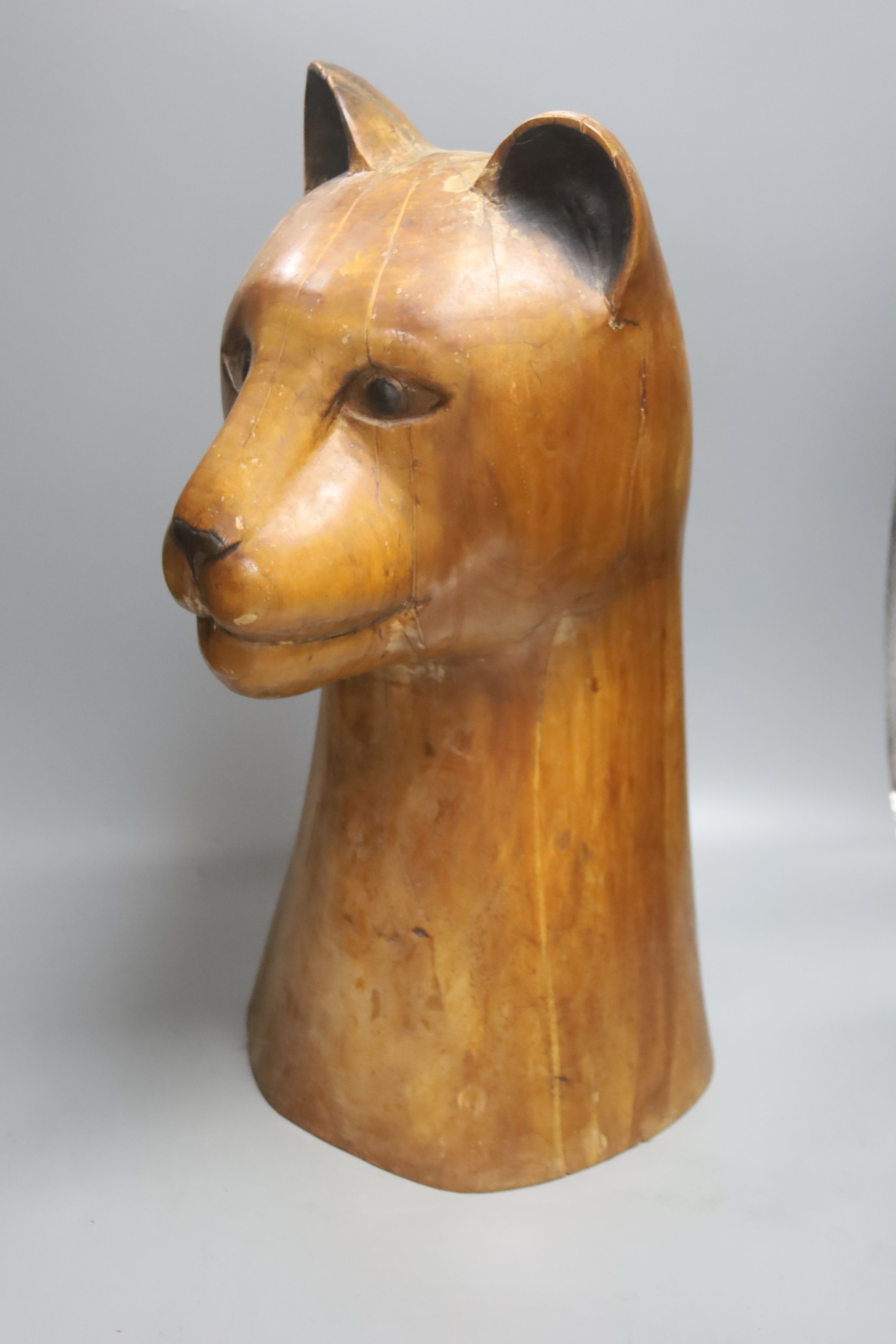 A large carved wood model, head of a leopard, 54cm